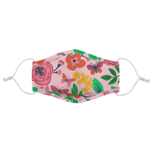 Mascarilla para niña con diseño de flores varios colores