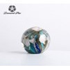 Esfera de vidrio colores azul verde café y blanco 3.5"