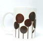 Taza blanca diseño circulares cafe