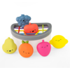 Frutero de juguete blanco con frutas multicolores para bebe