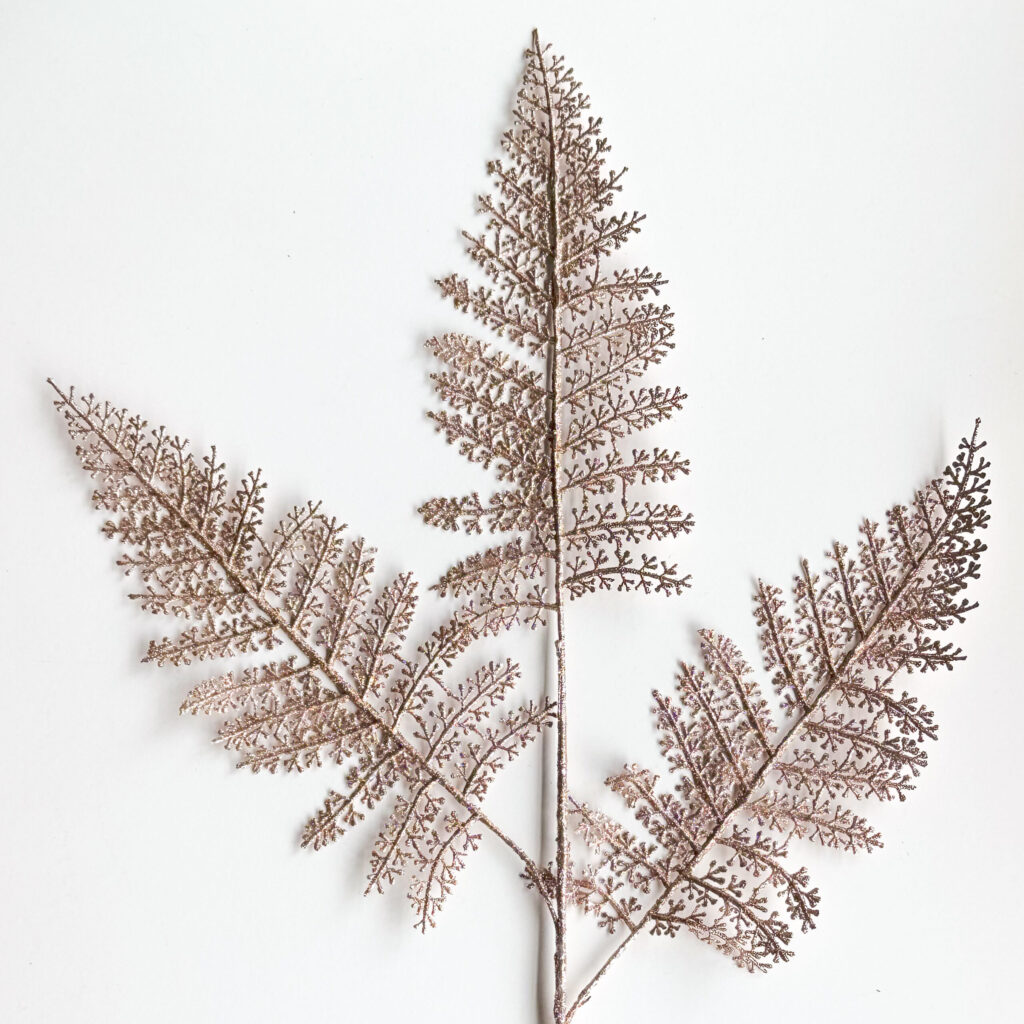 Spray navideño brillante color champagne