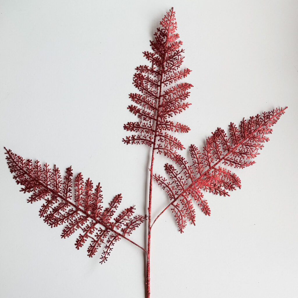 Spray navideño brillante color rojo