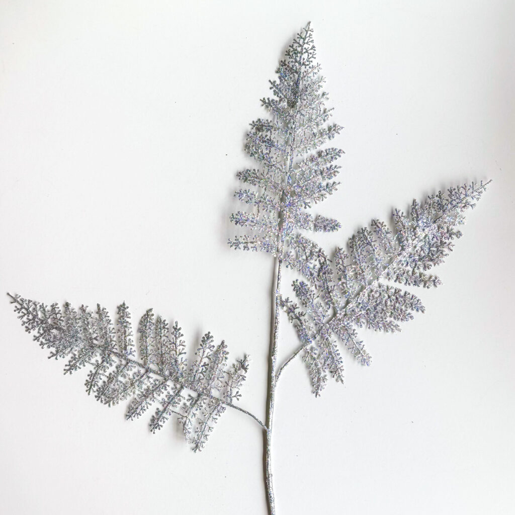 Spray navideño brillante tono plateado