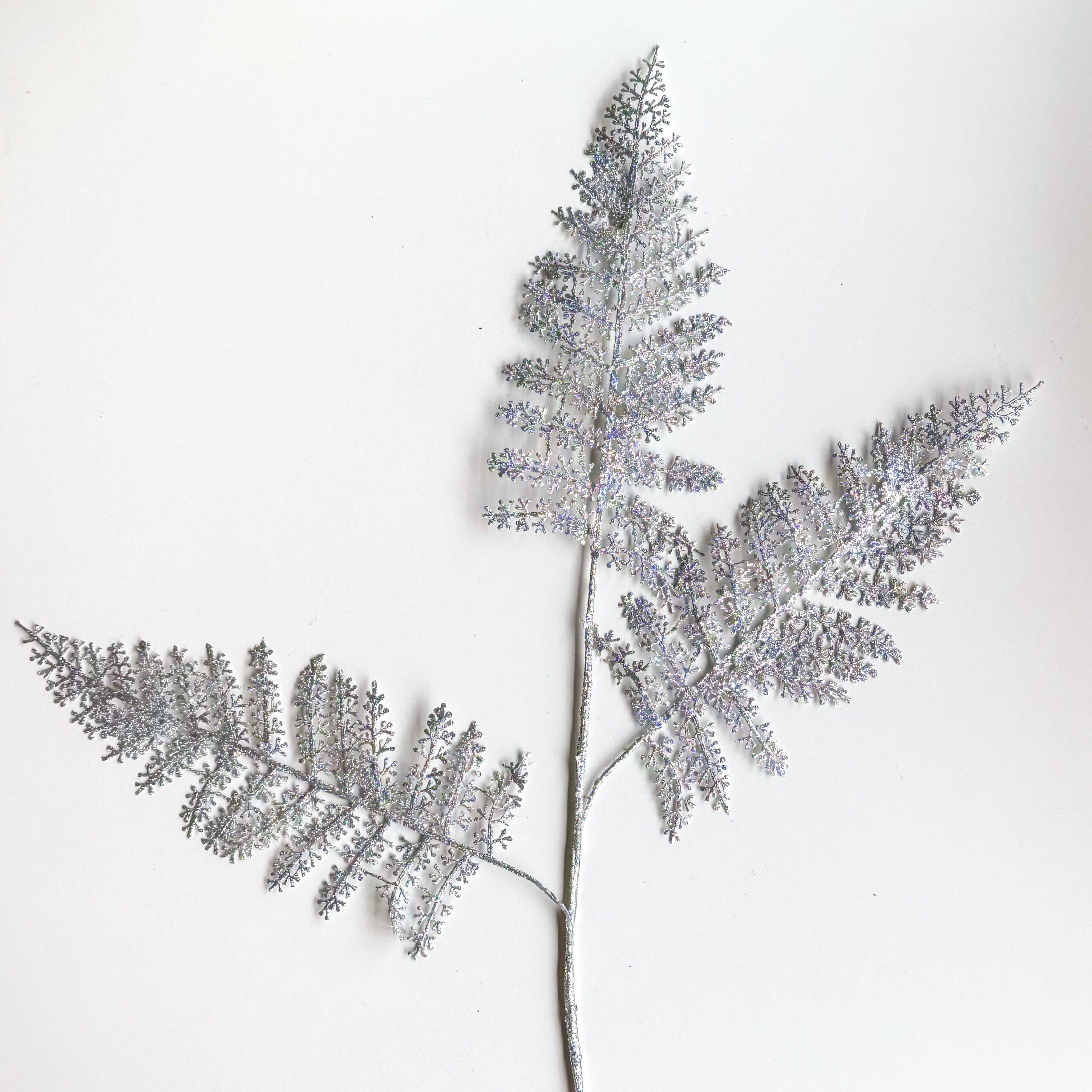 Spray navideño brillante tono plateado